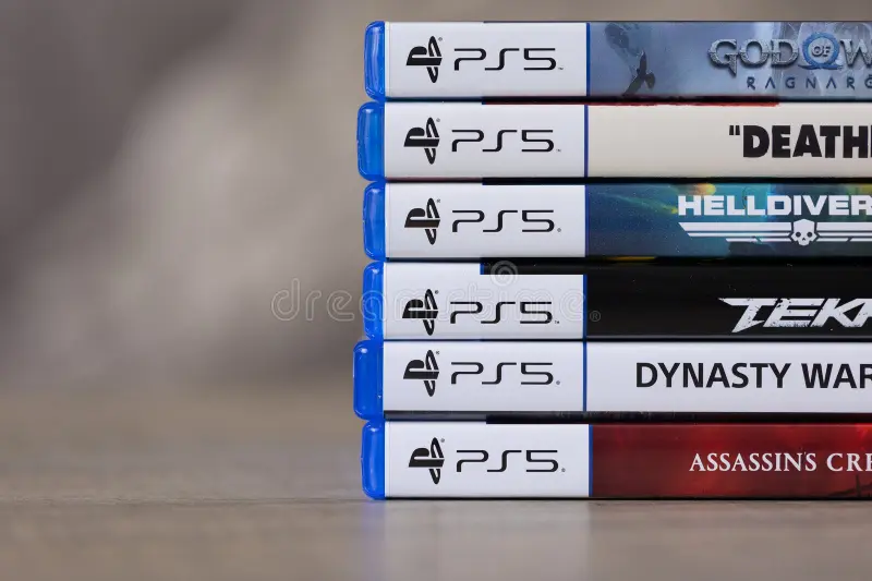 stack multiple sony playstation videogame cases